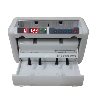 
          	<h3 class='specs'>Specification</h3>
          	<ul>
          		<li>Counterfeit Detector : UV (Ultraviolet) , MG (Magnetic)</li>
				<li>Suitable for Most Currency</li>
				<li>Automatic Start , Stop & Clearing</li>
				<li>Batching & Adding : 1 ~ 999</li>
				<li>Counting Speed : 900pcs per minute</li>
				<li>Countable Note : 50mm x 110mm / 90mm x 185mm</li>
				<li>Dimension : 270mm x 140mm 175mm</li>
				<li>Net Weight : 2.5kg</li>
				<li>Power : AC(220V ~ 100V) / DC(12V)</li>
				<li>Built-In DC-12V Rechargeable Battery</li>
				<li>Hopper Capacity : 300pcs</li>
				<li>Stacker Capacity : 300pcs</li>
          	</ul>
          	